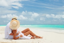 Couple on the beach at the ocean